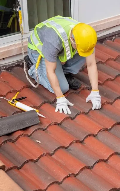 roof replacement Roof replacement in Willmar, MN: contractor replacing shingles on residential roof for durable storm protection